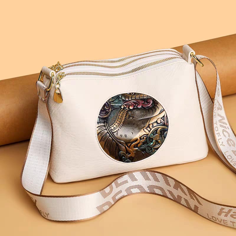 IMPORTED ROUND CYLINDRICAL ELIPHENT PATCHED SLINGBAG WITH BROAD BELT..!