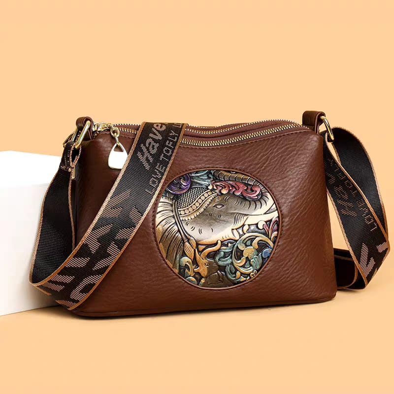 IMPORTED ROUND CYLINDRICAL ELIPHENT PATCHED SLINGBAG WITH BROAD BELT..!